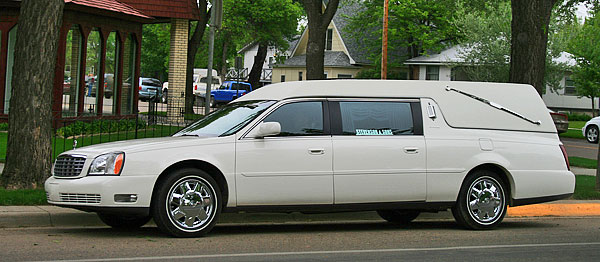Our white conventional Cadillac hearse.